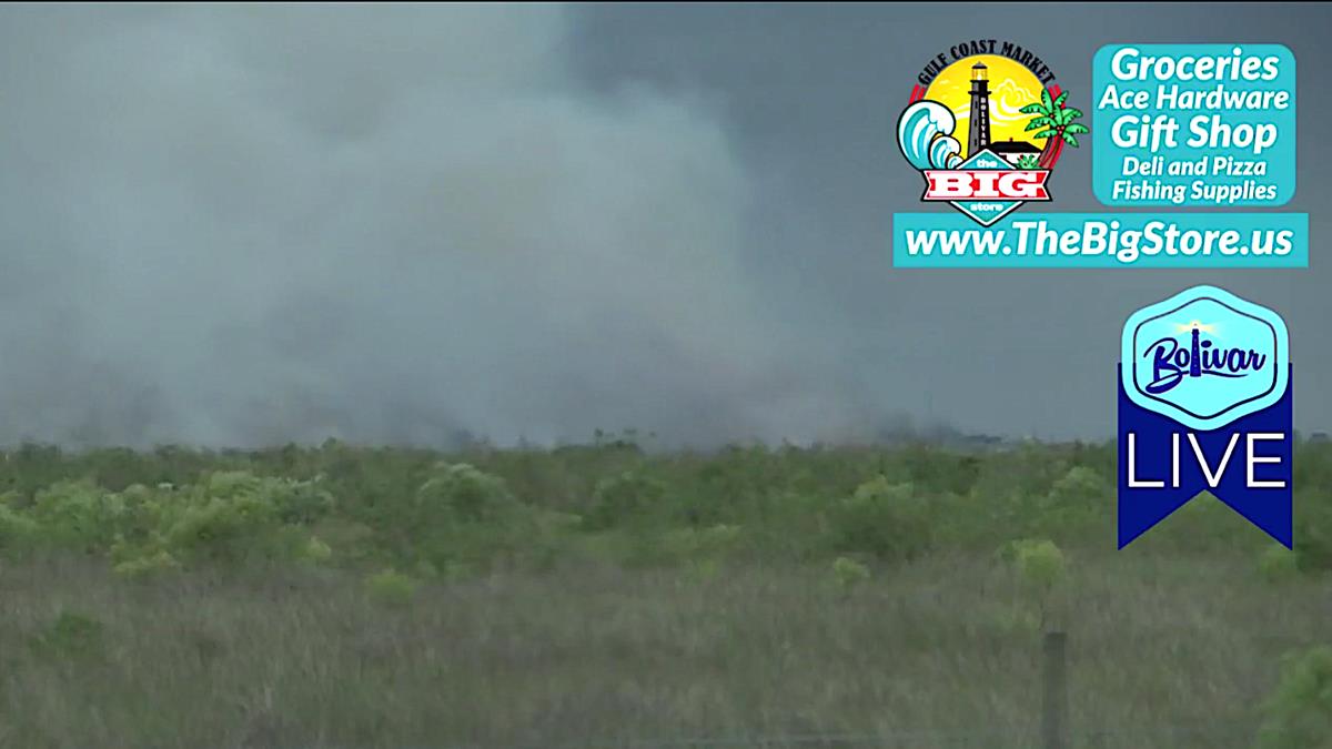 Fire Burns Through The Night On Bolivar Peninsula.