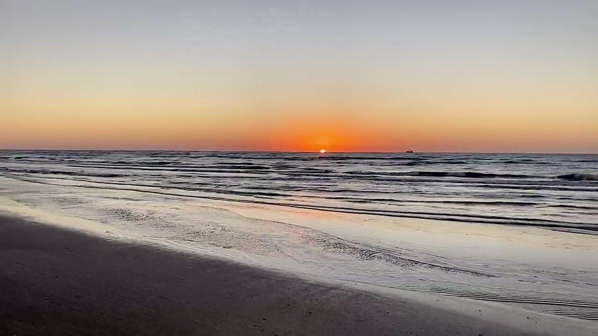 Painted Sky Sunrise Beachfront In Crystal Beach, Texas.