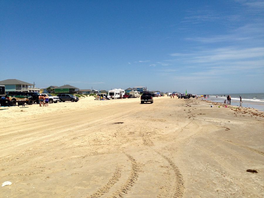 Cars driving on the beach at Bolivar Peninsula 